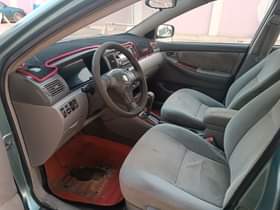 A picture of Sharp corolla 2007 direct baked on first body nothing to