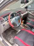 A picture of Sharp Grade 2004 Corolla Partly First Body Sound Silent Engine