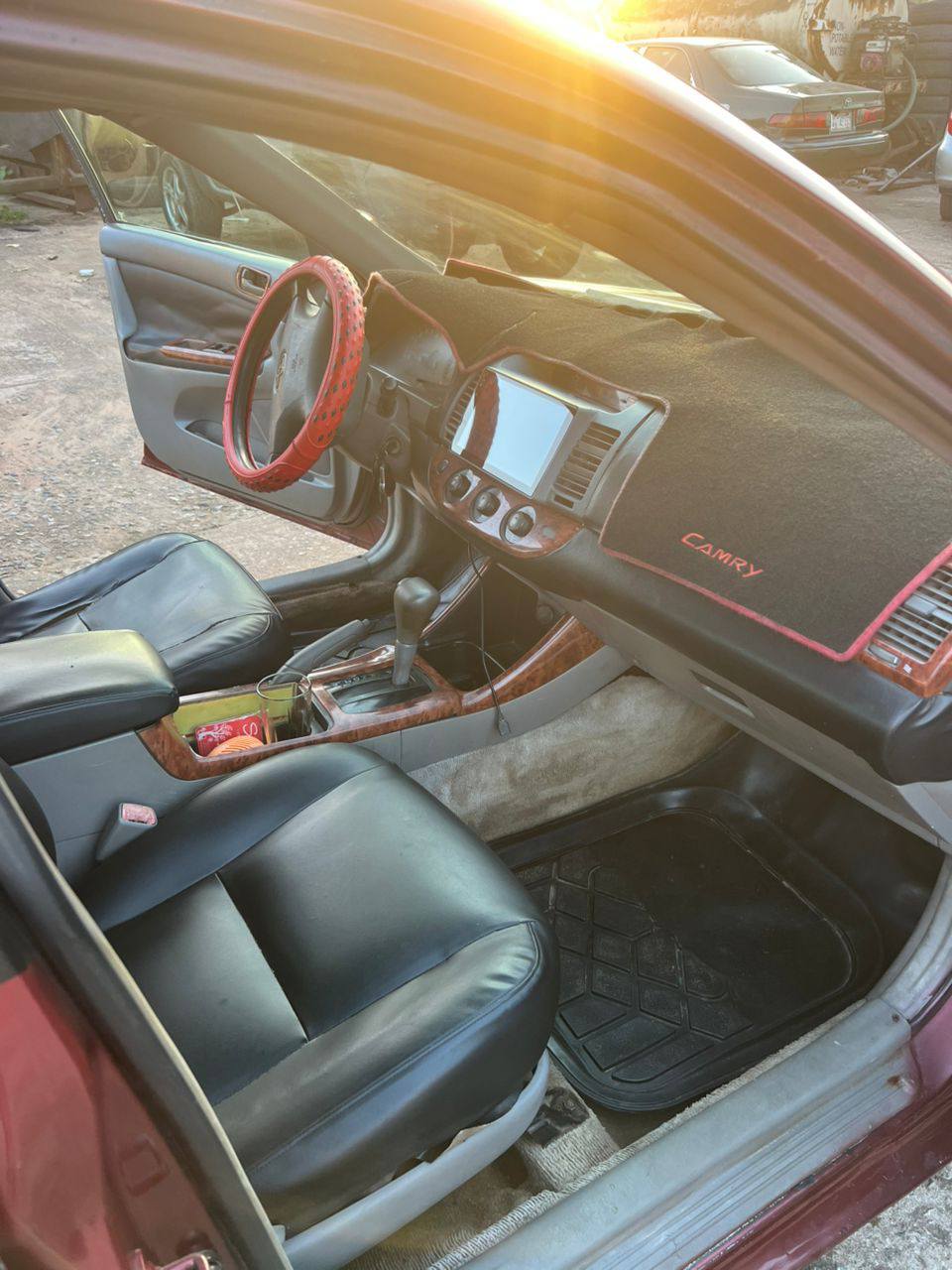 A picture of Registered Camry 04 upgraded to 06 in fair condition.