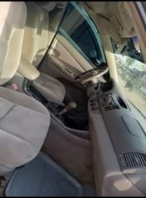 A picture of Toyota Camry 04 driving smooth Buy and paint bumper only