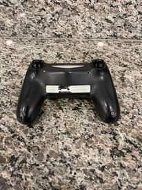 A picture of Used playstation 4 with EAFC 24 included