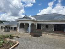 Kimathi M.