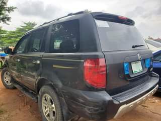 A picture of PERFECTLY NEATLY USAGE 2004 HONDA PILOT