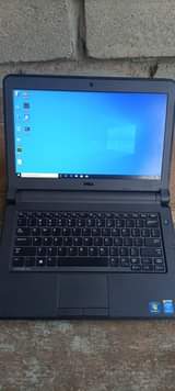 A picture of Dell i3 latitude portable laptop at only 600 000
