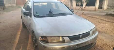 A picture of Mazda 323 Protege FIRSTBODY Dm or Call 09068030011 Beautiful in