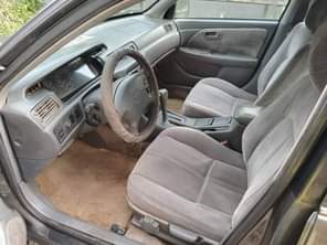 A picture of I need money tmrrow for my clean tiny light camry
