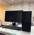 A picture of Desktop machines and monitor