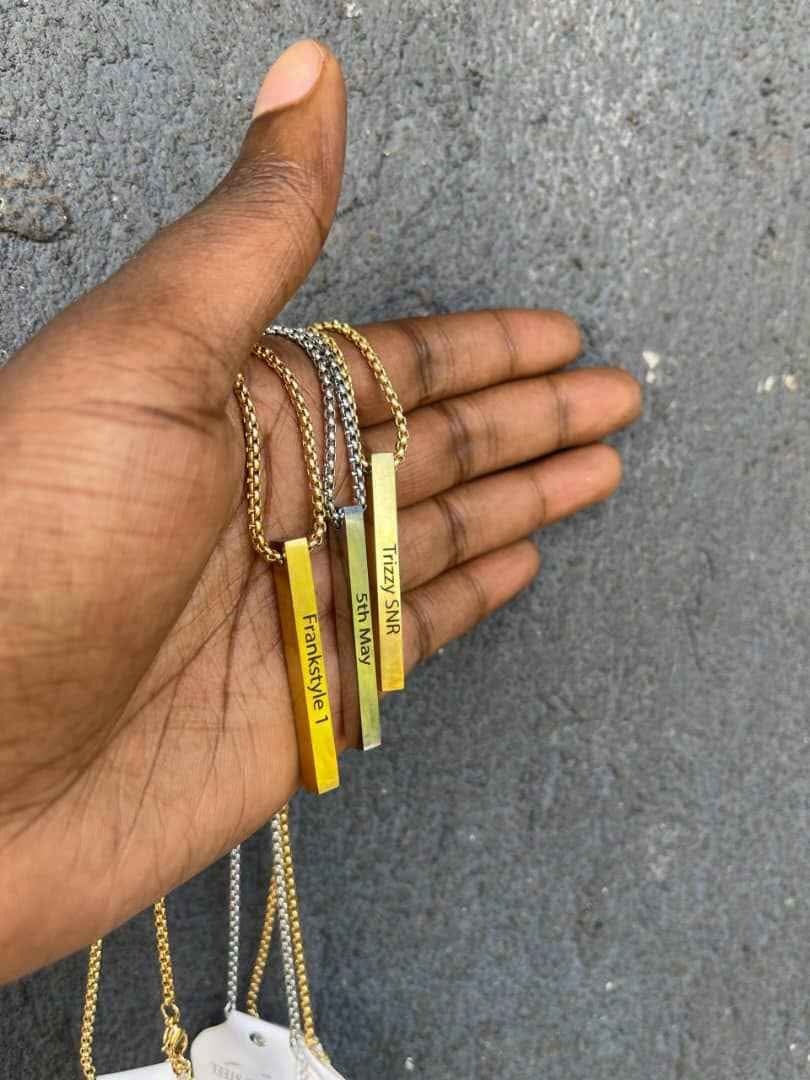 A picture of A bar necklace with your name Bible verse or quote
