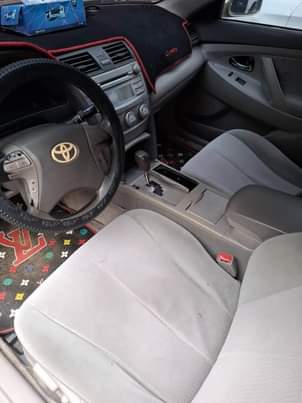 A picture of Distress distress Toyota muscle Camry 2010 model with venza engine