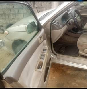 A picture of Toyota Camry 04 engine and gear perfect ok ac chilling