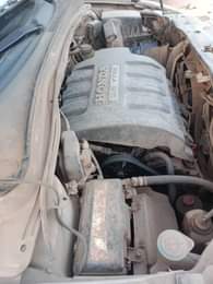 A picture of Neatly used first body pan Honda pilot jeep for sale