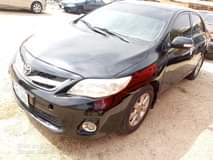 A picture of Toyota Corrola 2011 model for sale clean body and interior
