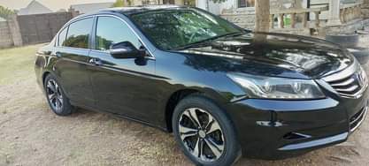 A picture of Honda Accord 2008 model buy and drive Clean body and