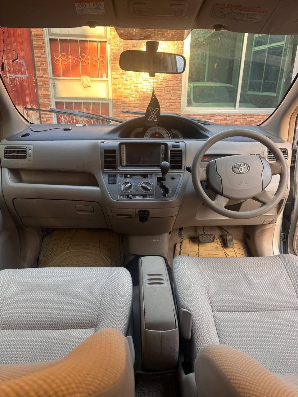A picture of Toyota Raum DWU PRICE 12 800 000 Tshs CONTACT 0769265727