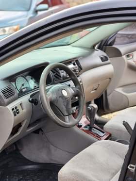 A picture of EXTREMELY SHARP PRE OWNED 2004 TOYOTA COROLLA LE CLEAN INTERIOR