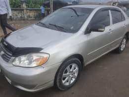 A picture of The name of this Corolla is Buy and Drive In