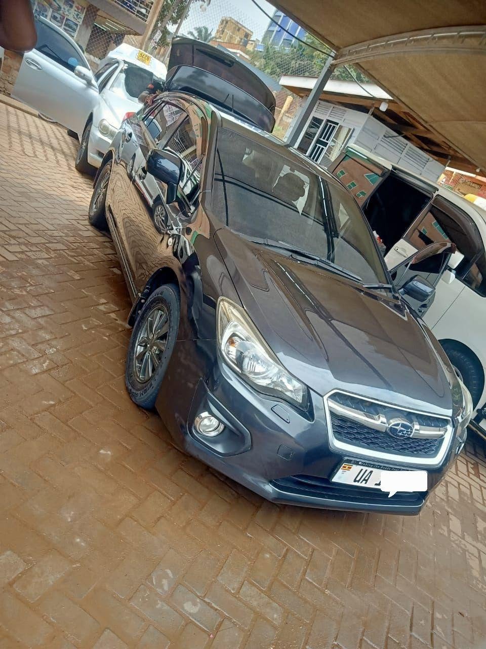 A picture of harrier hybrid 52m ugx subaru impreza 25m ugx