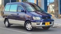 A picture of TOYOTA NOAH SR40 BEI MILLION 15 8
