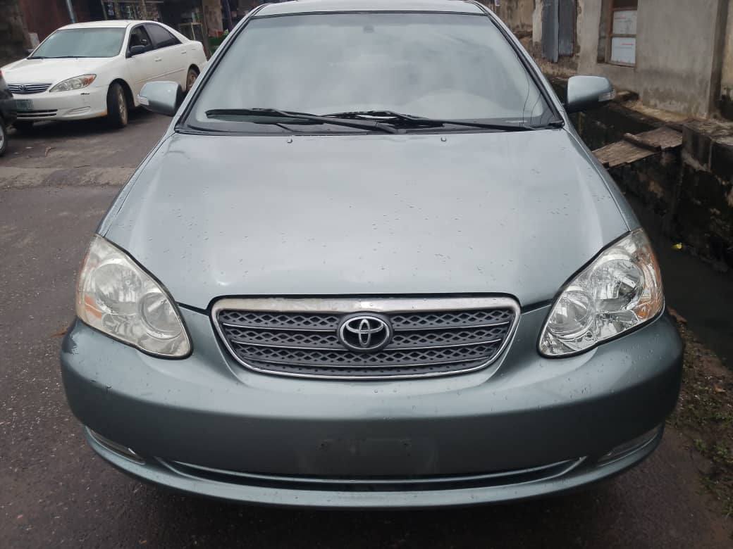 A picture of Toyota Corolla. 2003 model. Tok standard Working perfectly. Fabric Seats.
