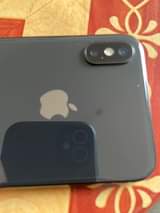 A picture of Iphone x 64gb with face id 100 battery health not