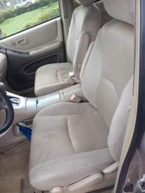 A picture of 2023 entry Toyota Highlander used by my pastor its V4