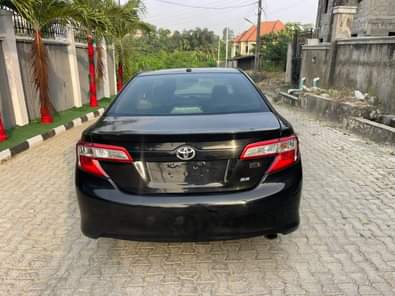 A picture of This is crispy clean Camry 2013 model sport utility barely