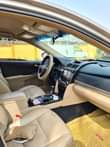 A picture of Premium Used 2014 Cream on Cream Toyota Camry LE