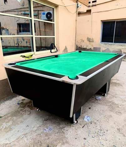 A picture of Snooker board with full accessories