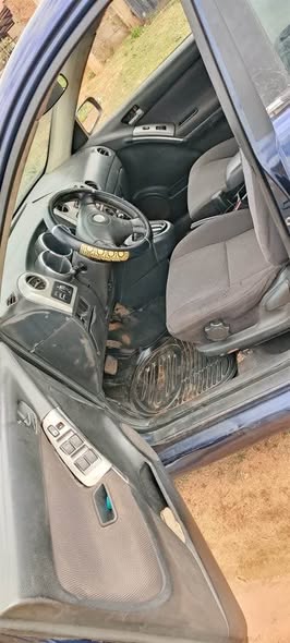 A picture of TOYOTA MATRIX 2003 GOOD ENGINE AND GEAR AC CHILLING AVAILABLE