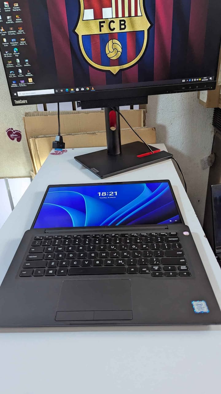 A picture of Dell 7400 i7 8thgen 8gbram 256ssd btry 5hrs watsup me