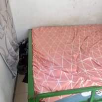 A picture of Kitanda na godoro vyote