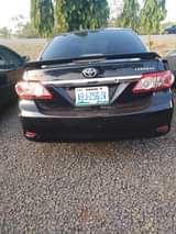 A picture of 2013 Toyota Corolla LE good engine and gear Chilling AC.