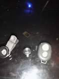 A picture of Tripod with extra 2 lens and Bluetooth device