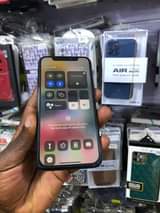 A picture of iPhone X 64gb storage Face ID 100 battery 900000 only
