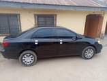 A picture of Distress 2006 Corolla with untermpared engine gear AC and neat