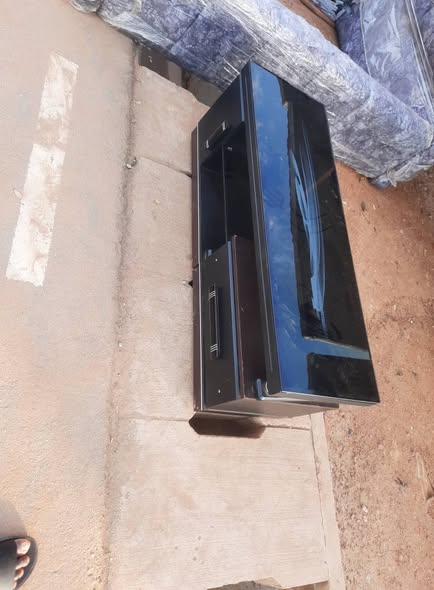 A picture of very clean and Neatly use foreign tv stand for sale