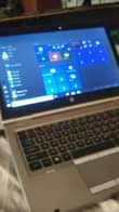 A picture of HP elite laptp pluz Aqous phone sle