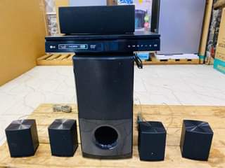 A picture of Lg 5.1 channel Bluetooth Hometheater 1000watts with all accessories all