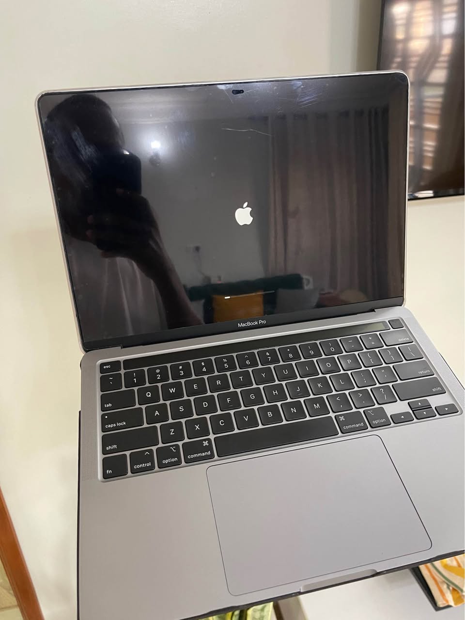 A picture of Apple Mac book pro Touch Bar with 512gb storage and