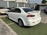 A picture of Mitsubishi Lancer 2010 model First body Price 2 750M Location