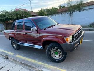 A picture of TOYOTA HILLUX PICKUP FULL DOC FULL AC PRICE 20mill
