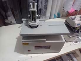 A picture of curtains punch machine eyelet curtains machine grommet machine