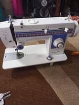 A picture of Electric sewing machine with designs