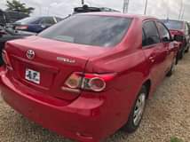 A picture of 2011 Corolla on a total distress sale extremely clean
