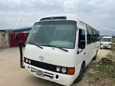 A picture of Neatly used Toyota coaster bus 2008 model flash on first