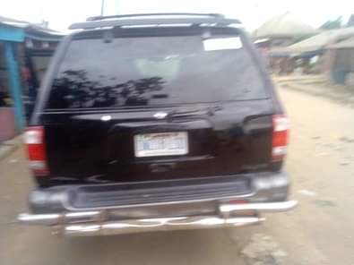 A picture of NISSAN PATHFINDER JEEP WITH AUXILIARY GEAR. VERY GOOD ENGINE AND