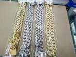 A picture of Iced chains and bracelets