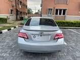 A picture of This is Camry 2010 model partly painted 4 plugs venza