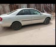 A picture of Toyota Camry 2004 Engine Gear Ac and body needs attention