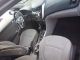 A picture of 2014 model accent bought brand new everything intact Price 2m